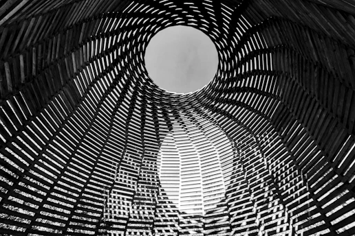 a black and white photo of a circular structure