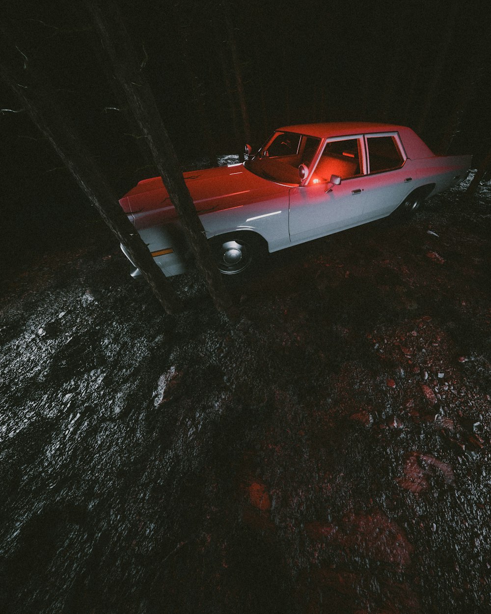 a car parked in a dark room