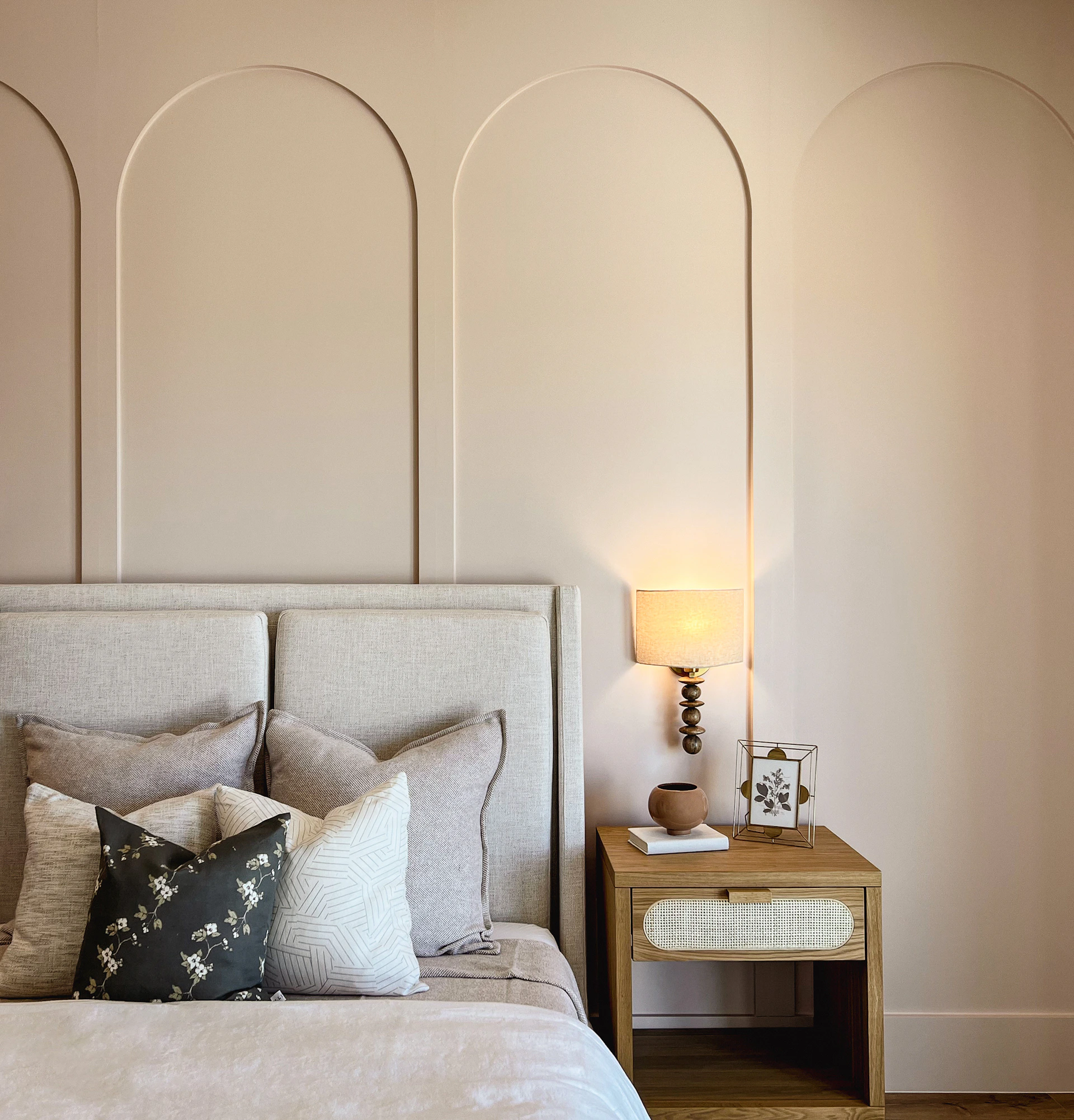 a bedroom with a bed in a room