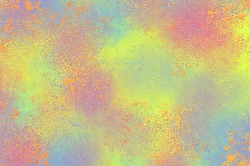 a multicolored texture of paint on a white background