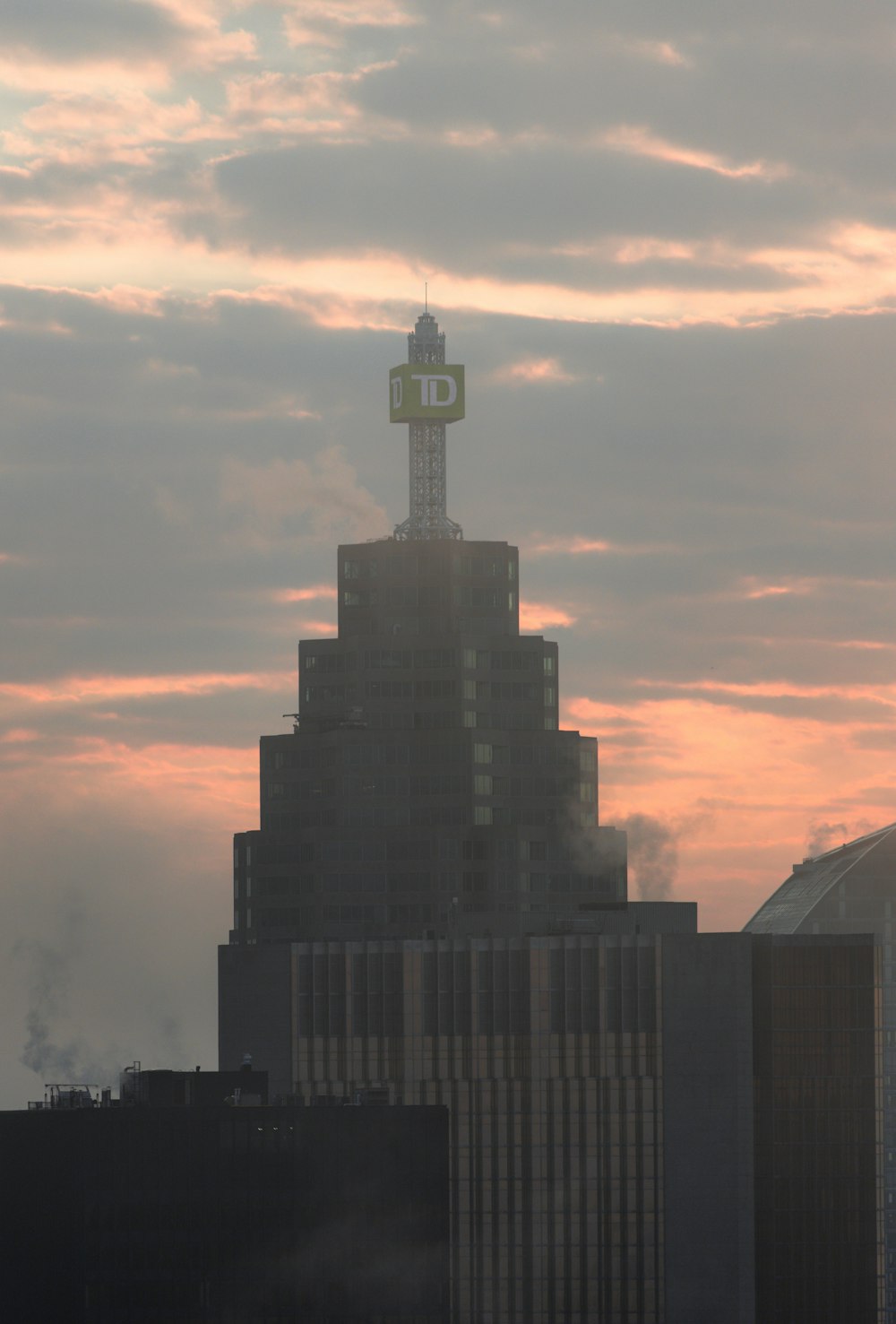 a very tall building with a clock on top of it