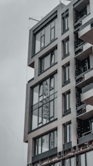 Sleek commercial building exterior with large glass windows and minimalist architectural details