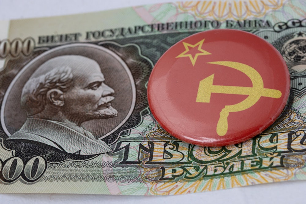 a button with a picture of a communist dictator on it