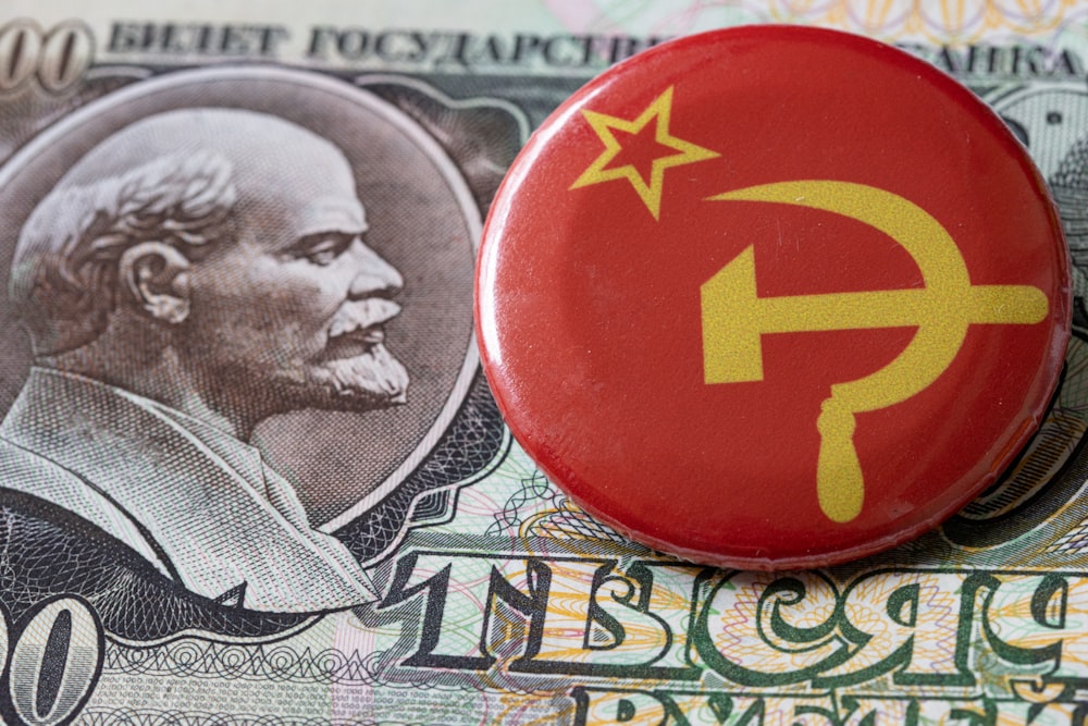 a button with a picture of a communist dictator on it