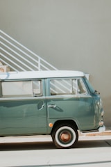 Campervan mid-respray showing vibrant lime green paint being applied.