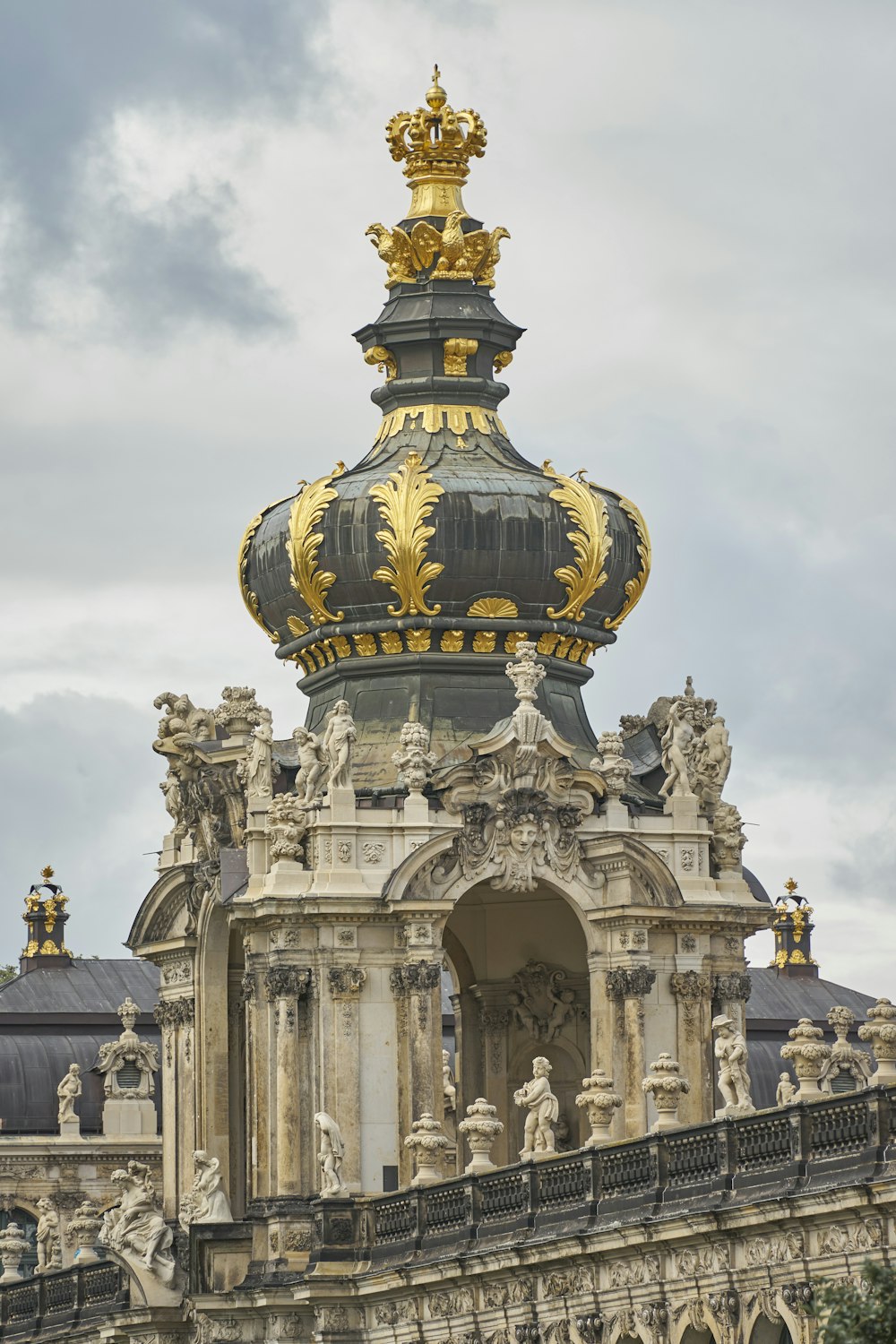 a large building with a golden dome on top of it