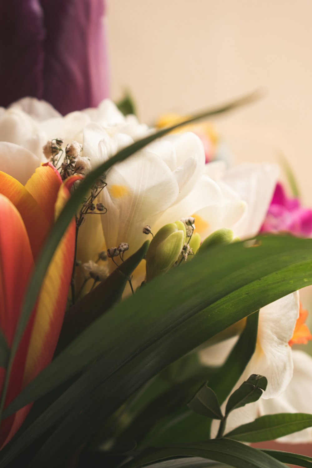 a bouquet of flowers sitting on top of a table