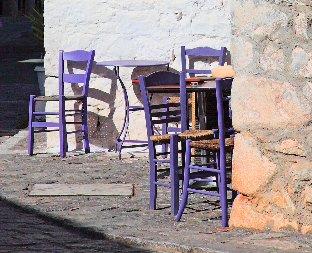 a couple of purple chairs sitting next to each other