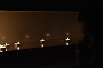 Soft glowing candles illuminating a mystical setting with spiritual symbols.
