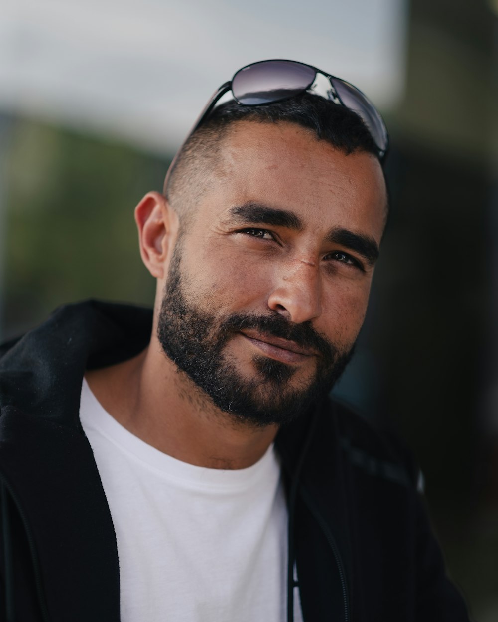 a close up of a person wearing sunglasses