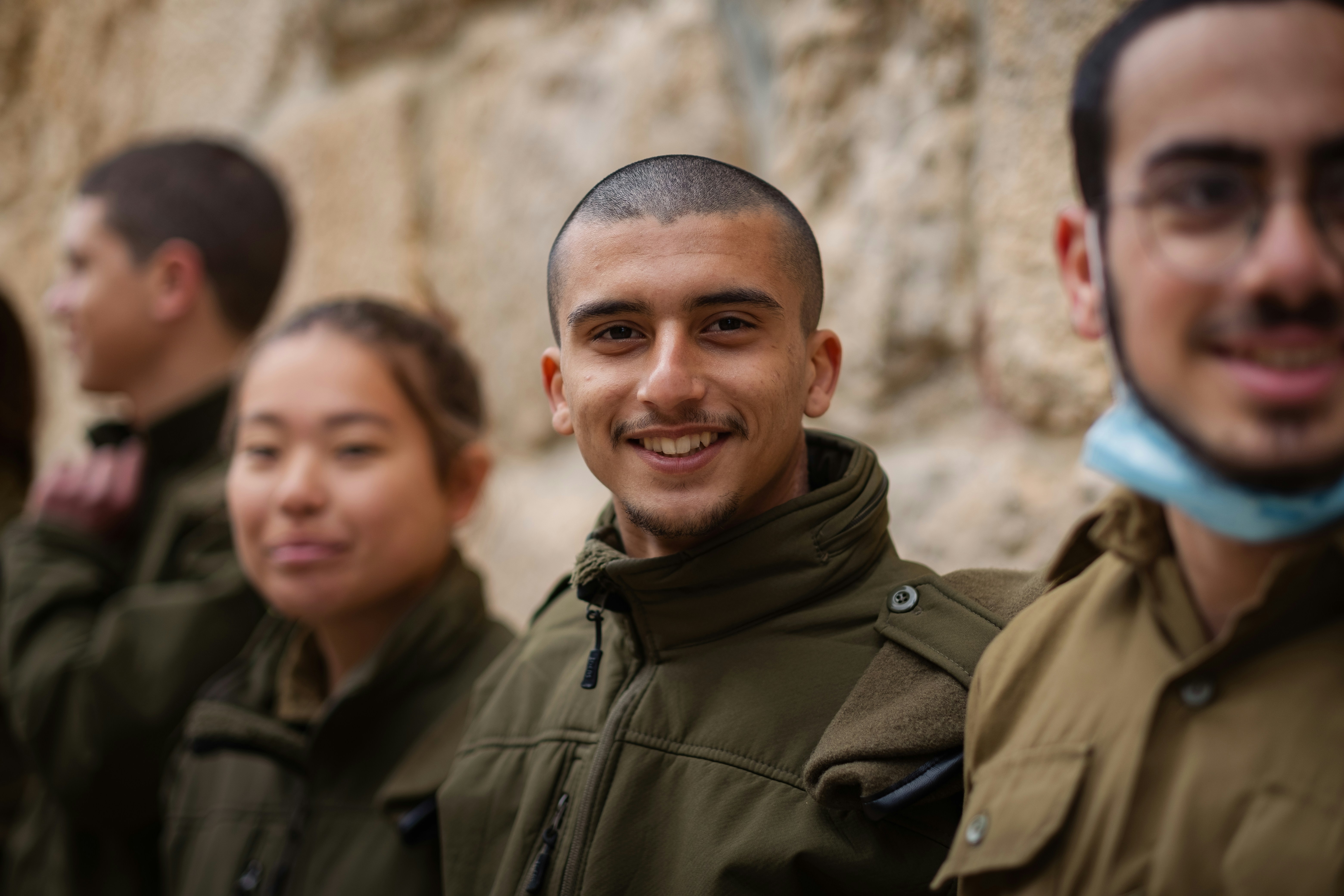 a group of people standing next to each other