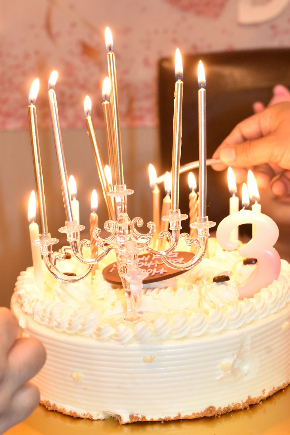 a white cake with a bunch of candles on it