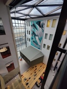 a room with a large painting on the wall