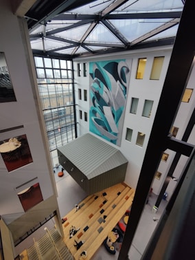 a room with a large painting on the wall