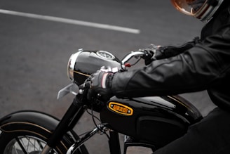 a person riding a motorcycle on a city street