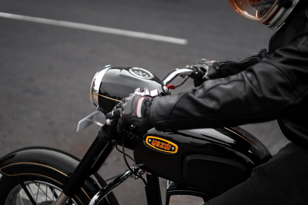 a person riding a motorcycle on a city street