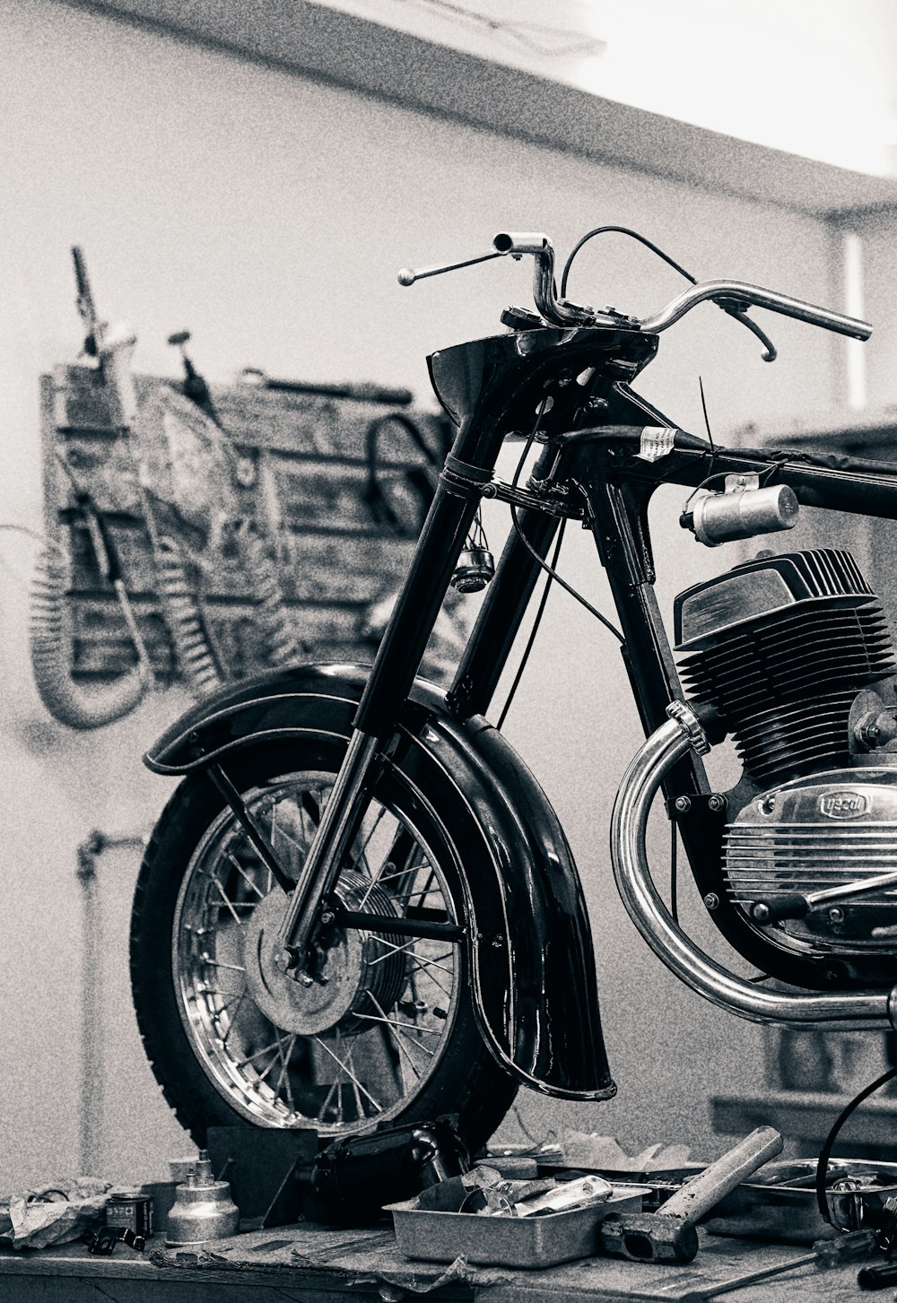a black and white photo of a motorcycle