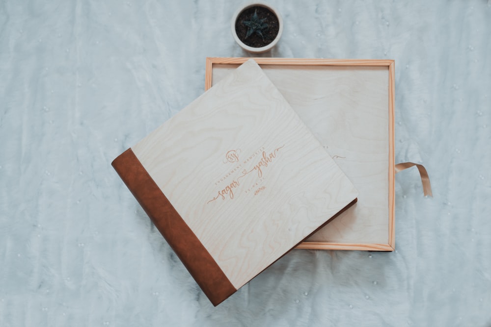 a couple of books sitting on top of a table