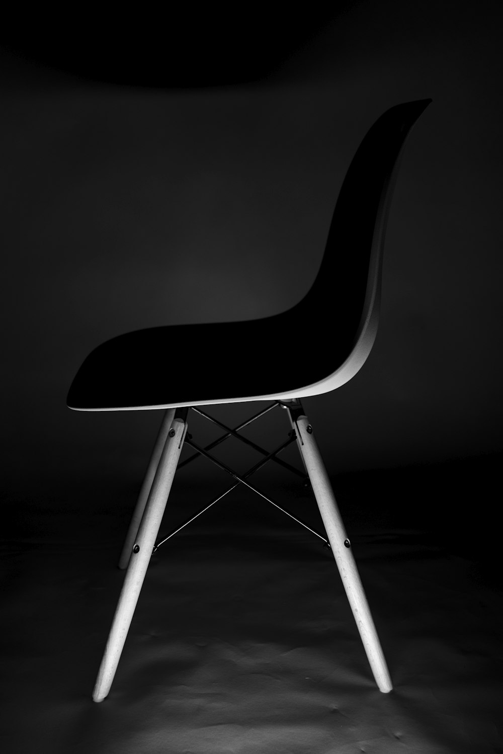 a black and white photo of a chair