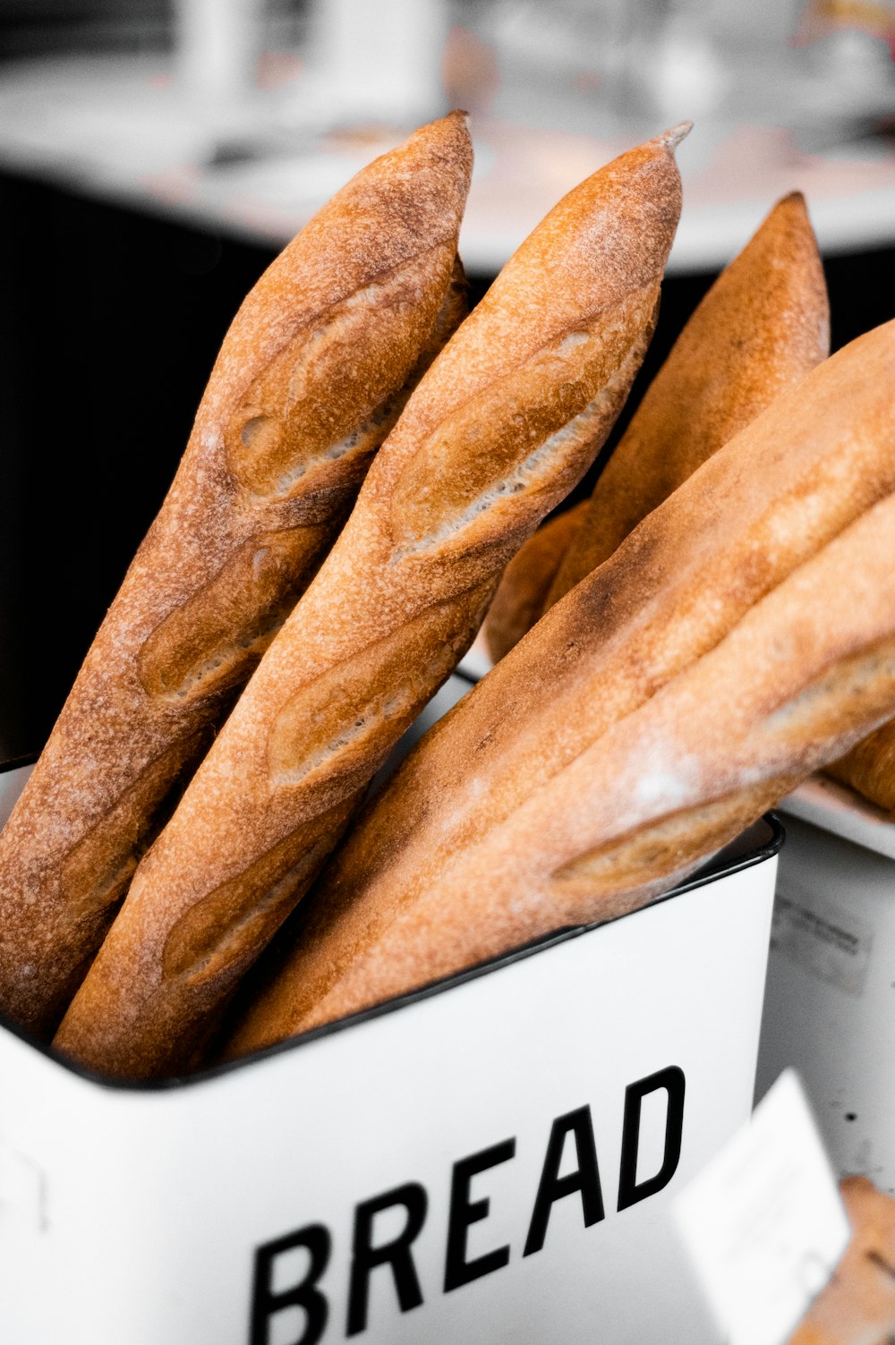 a box filled with loaves of bread