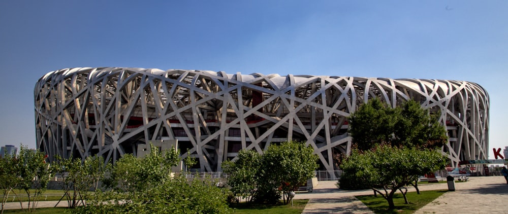 a large building with a large white structure on top of it