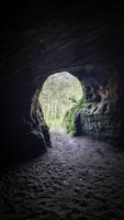 a dark tunnel with a light at the end
