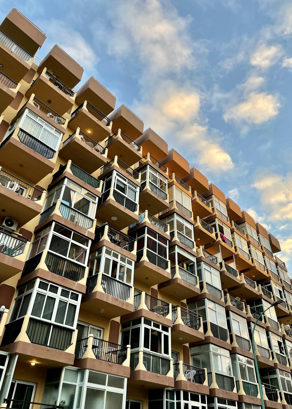 a very tall building with balconies and balconies