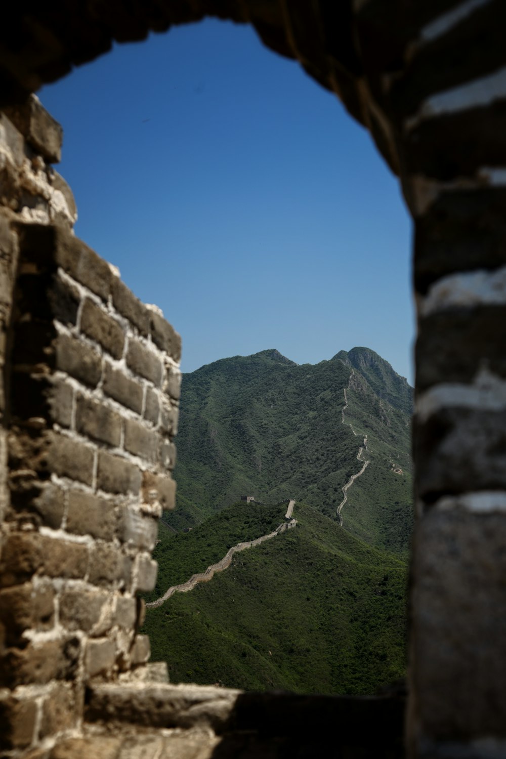 a view of the great wall of china through a window