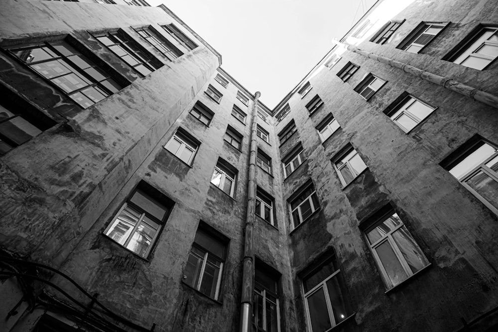 a black and white photo of tall buildings