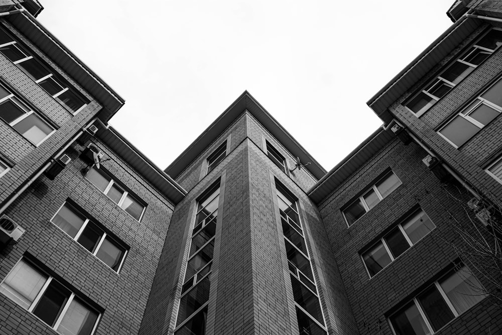 a black and white photo of a tall building