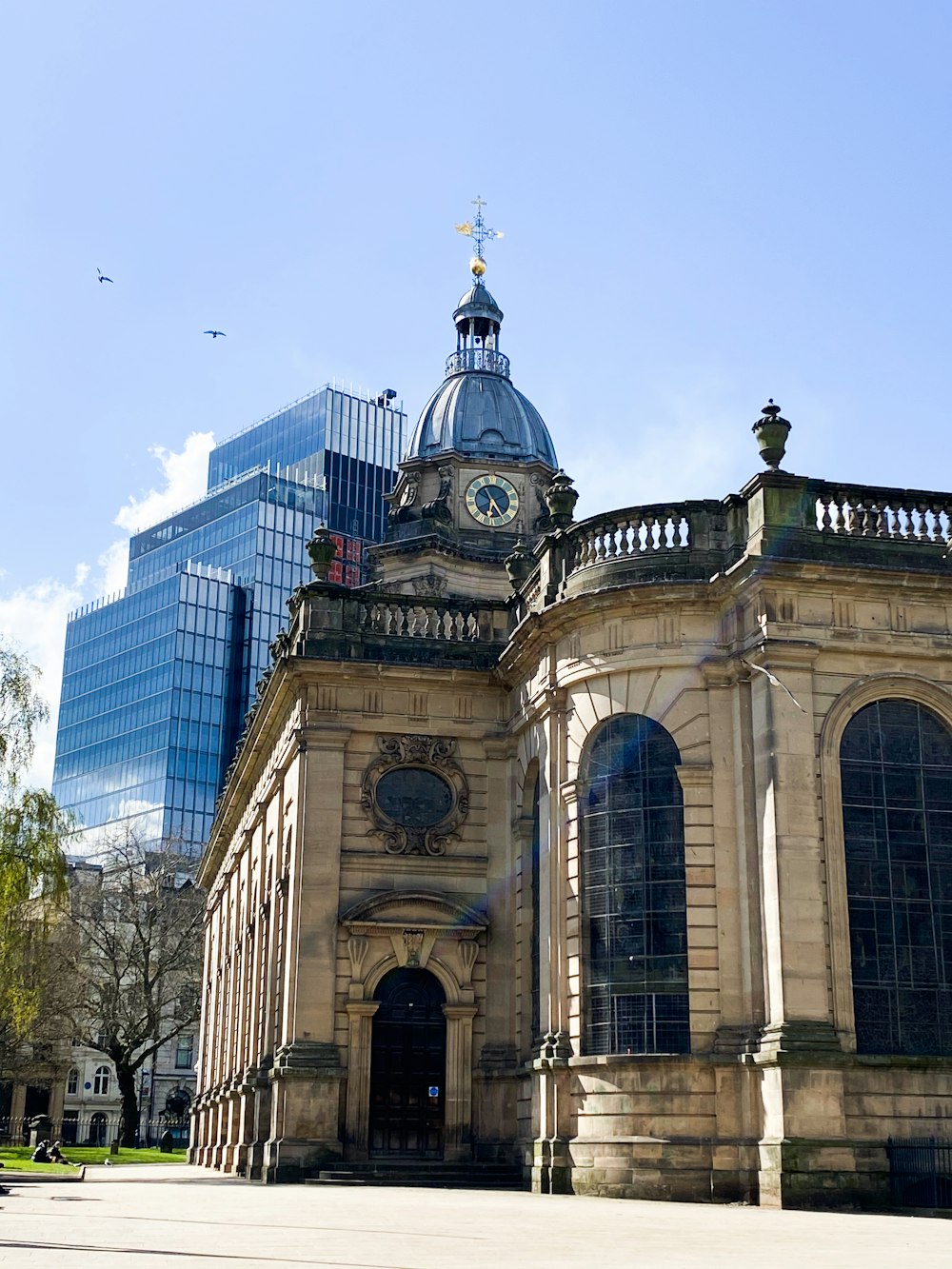 a large building with a clock on the top of it