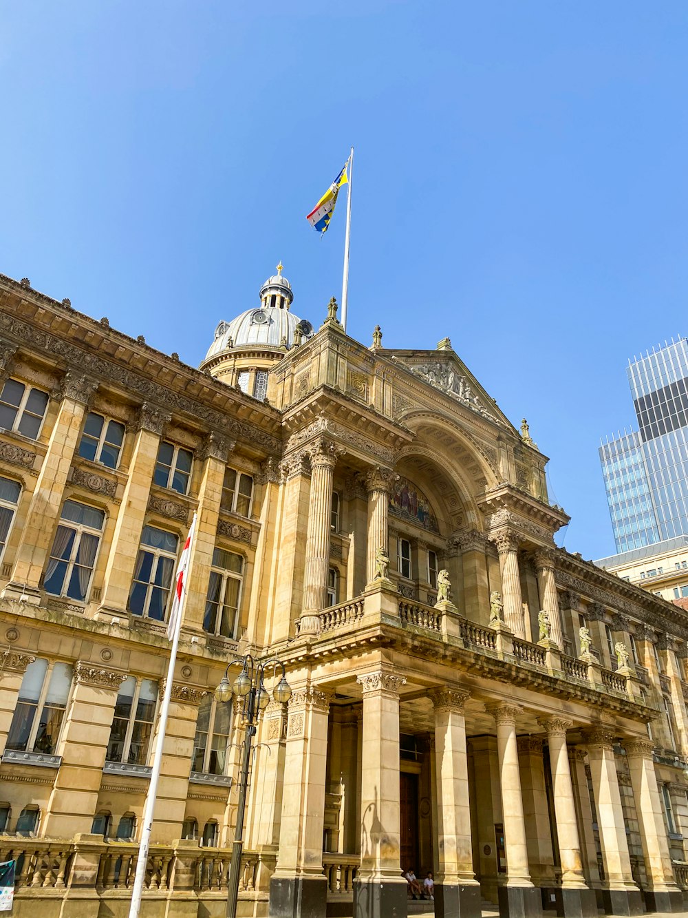 a large building with a flag on top of it