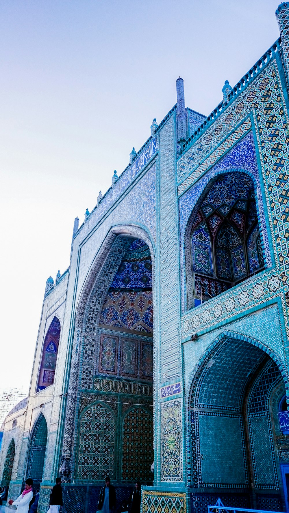 a large building with a blue and white design on it