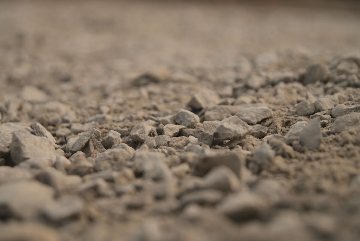 Base mix aggregate with gravel and fines for road sub-base