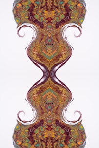 A colorful abstract illustration of mathematical symbols and shapes intertwined.