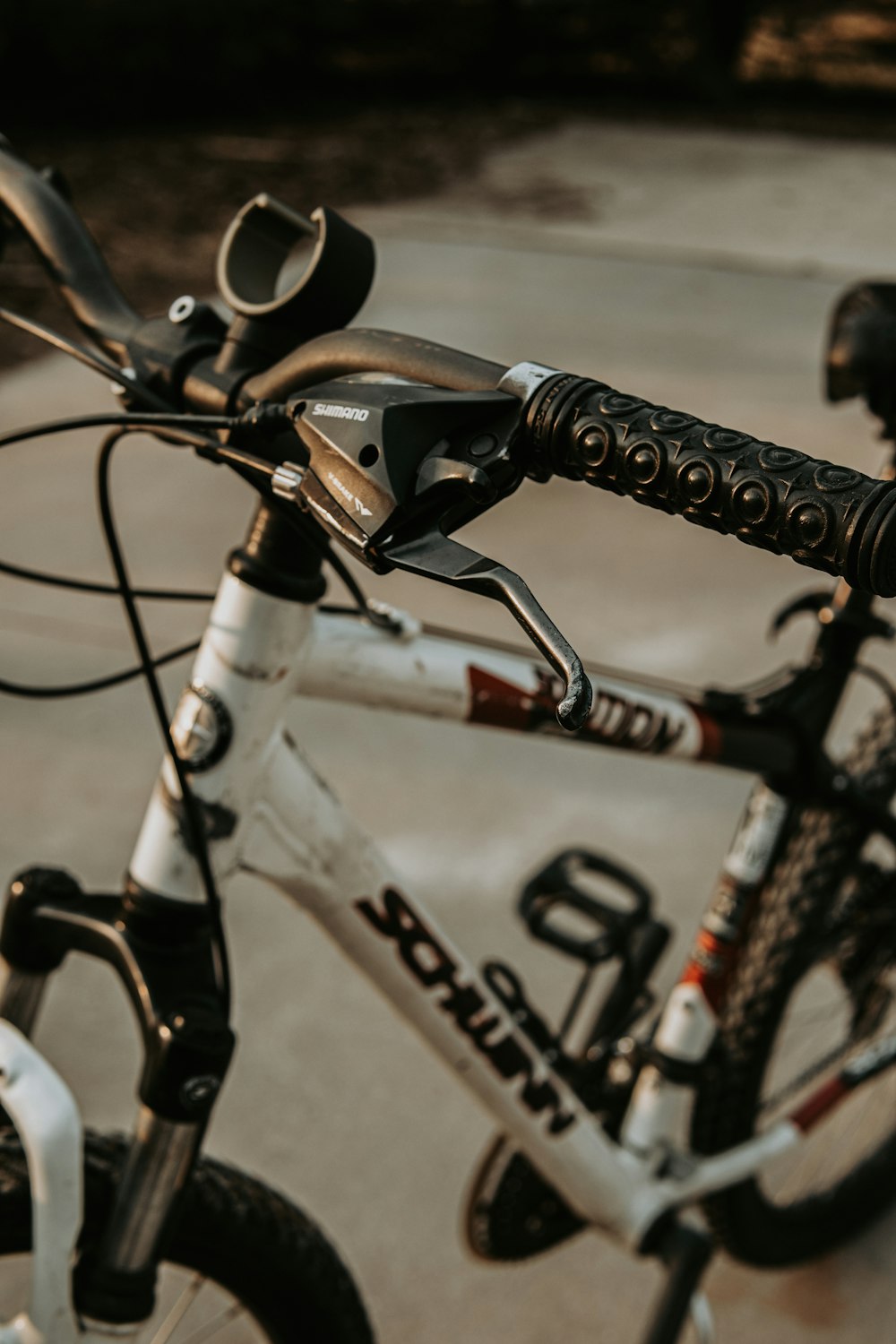 a close up of a bike parked on a street