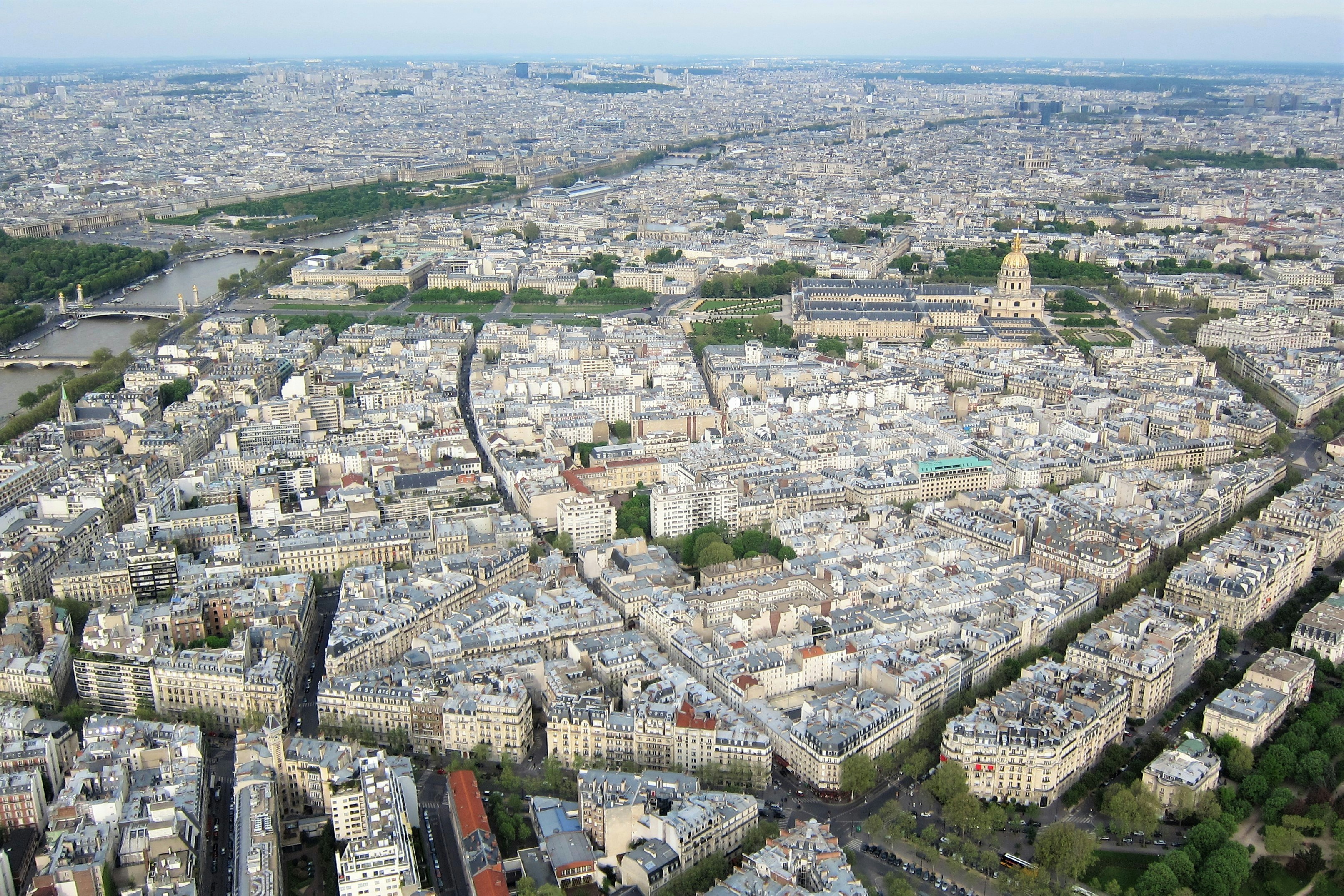 an aerial view of the city of paris, This is an aerial view of a central Paris, France. The primary building is  Les Invalides in the 7th arrondissement which houses Napoleon