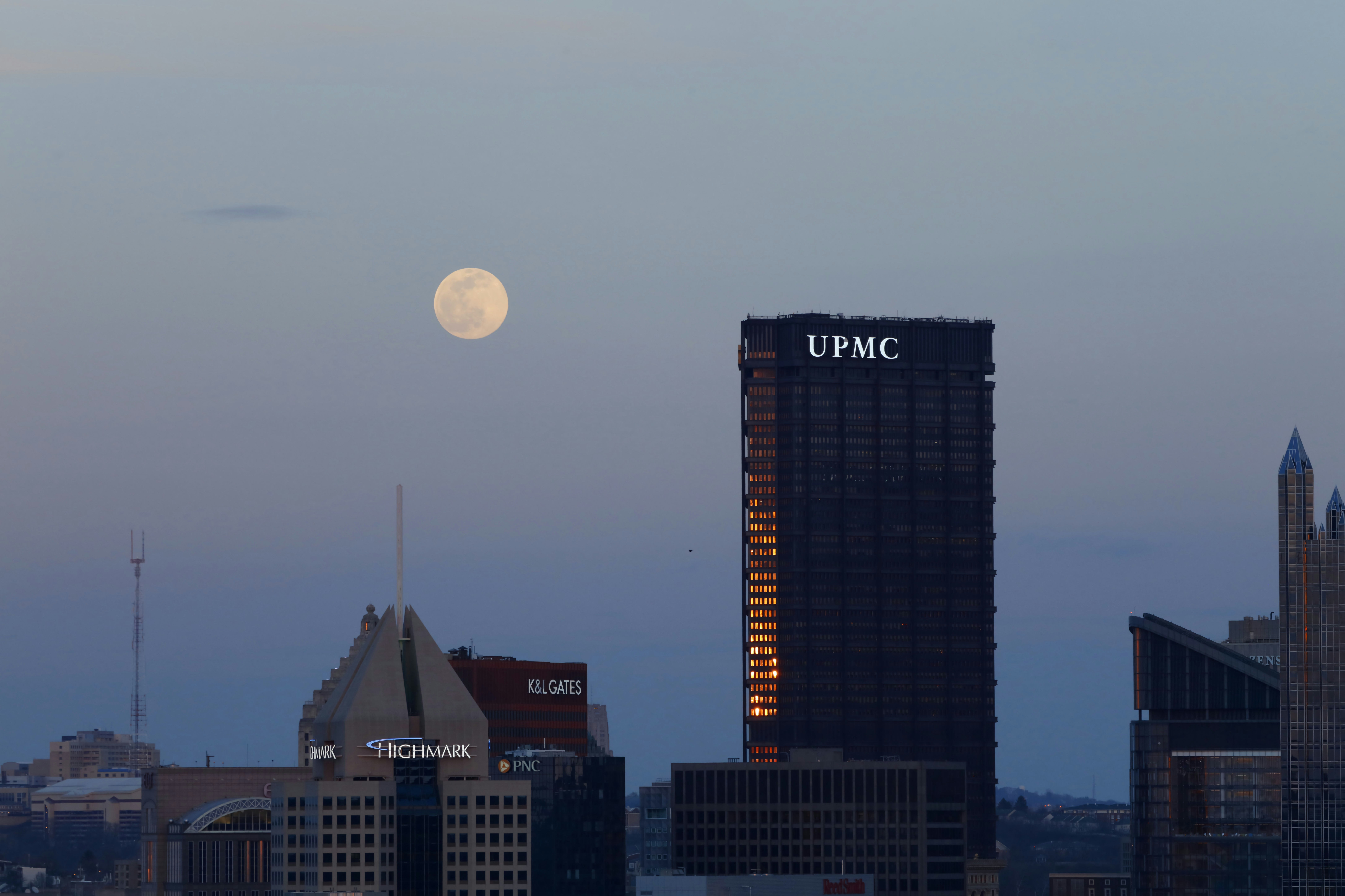 Full moon over city skyline, pittsburgh