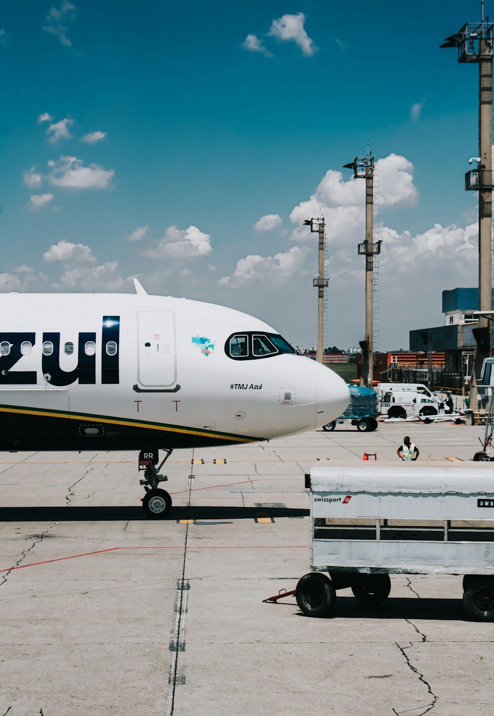 a large jetliner sitting on top of an airport tarmac