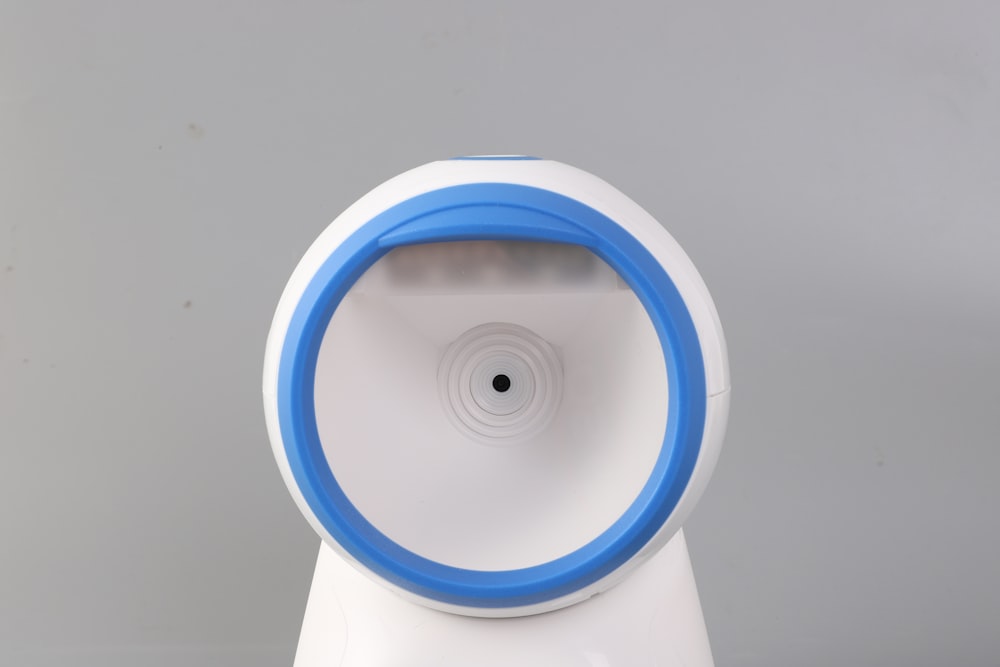a white and blue object sitting on top of a table