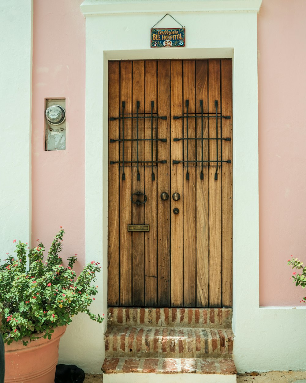 a door with a clock on the side of it