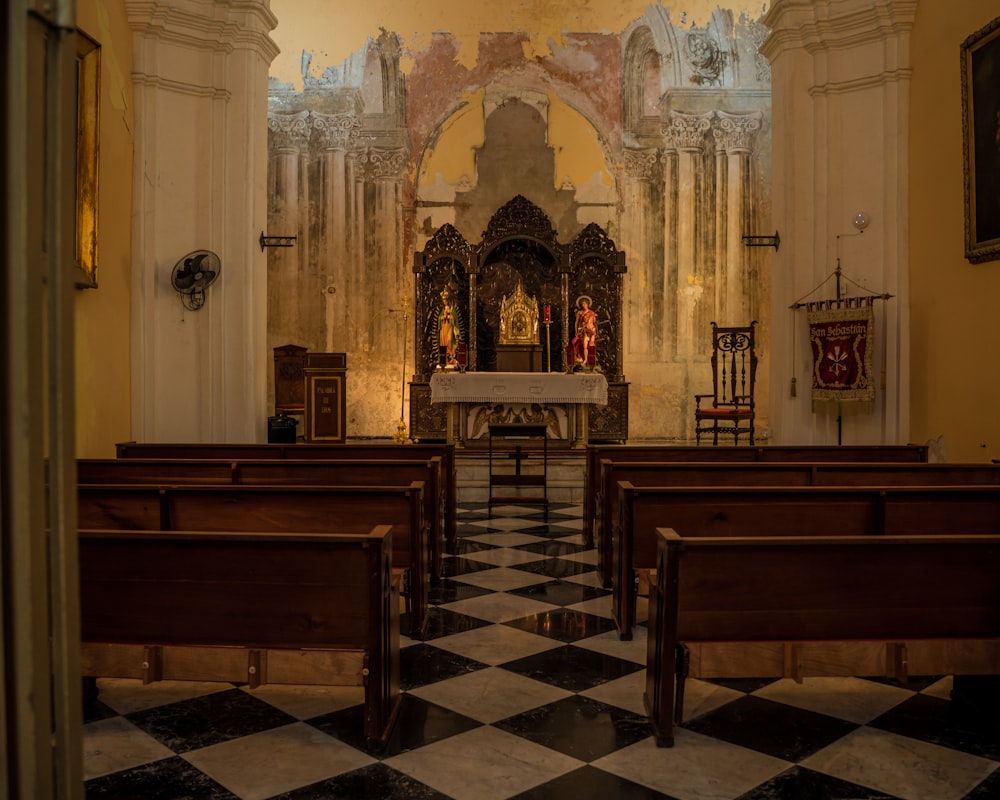 the interior of a church with a checkered floor