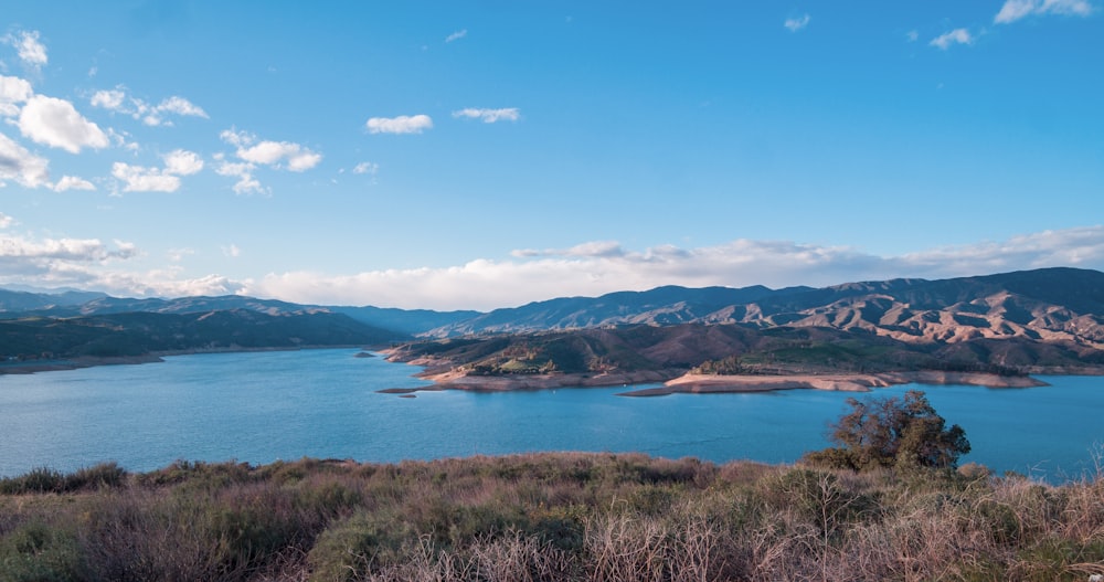 a large body of water surrounded by mountains