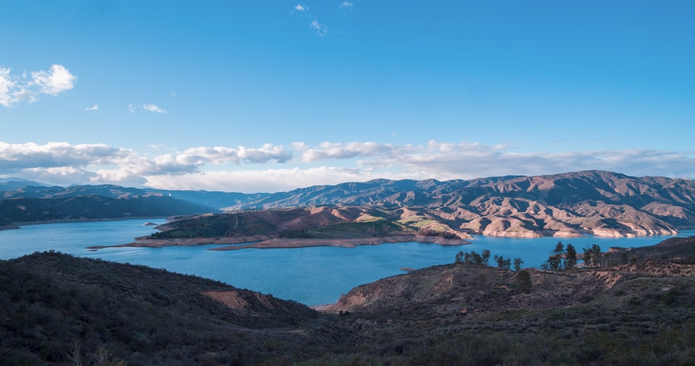 a large body of water surrounded by mountains