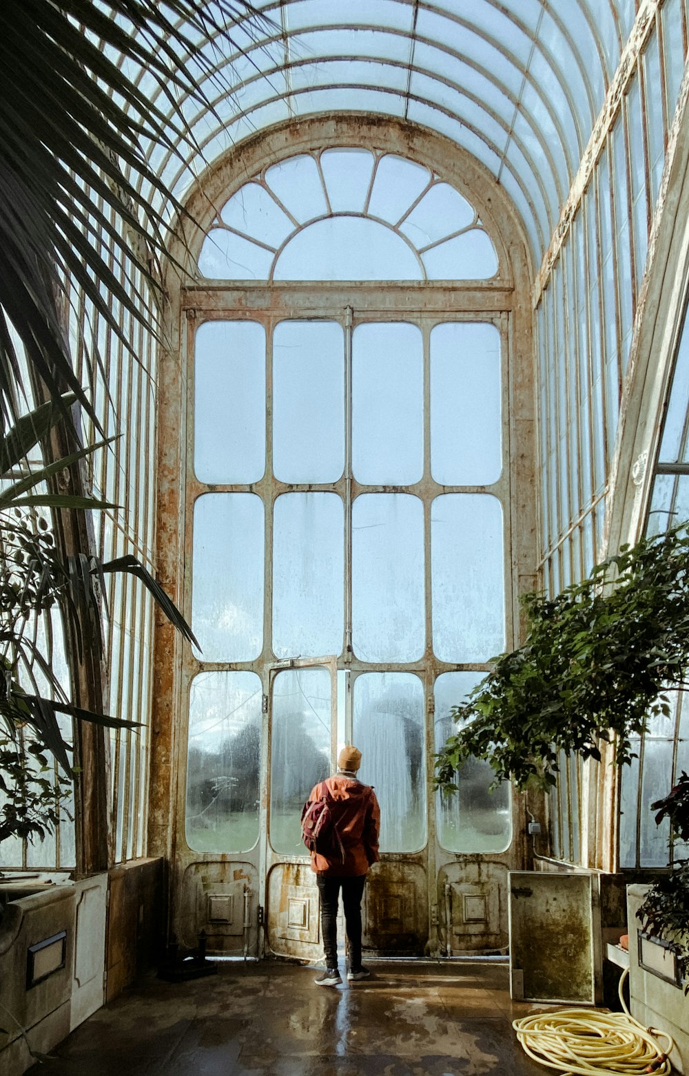 a person standing in front of a large window