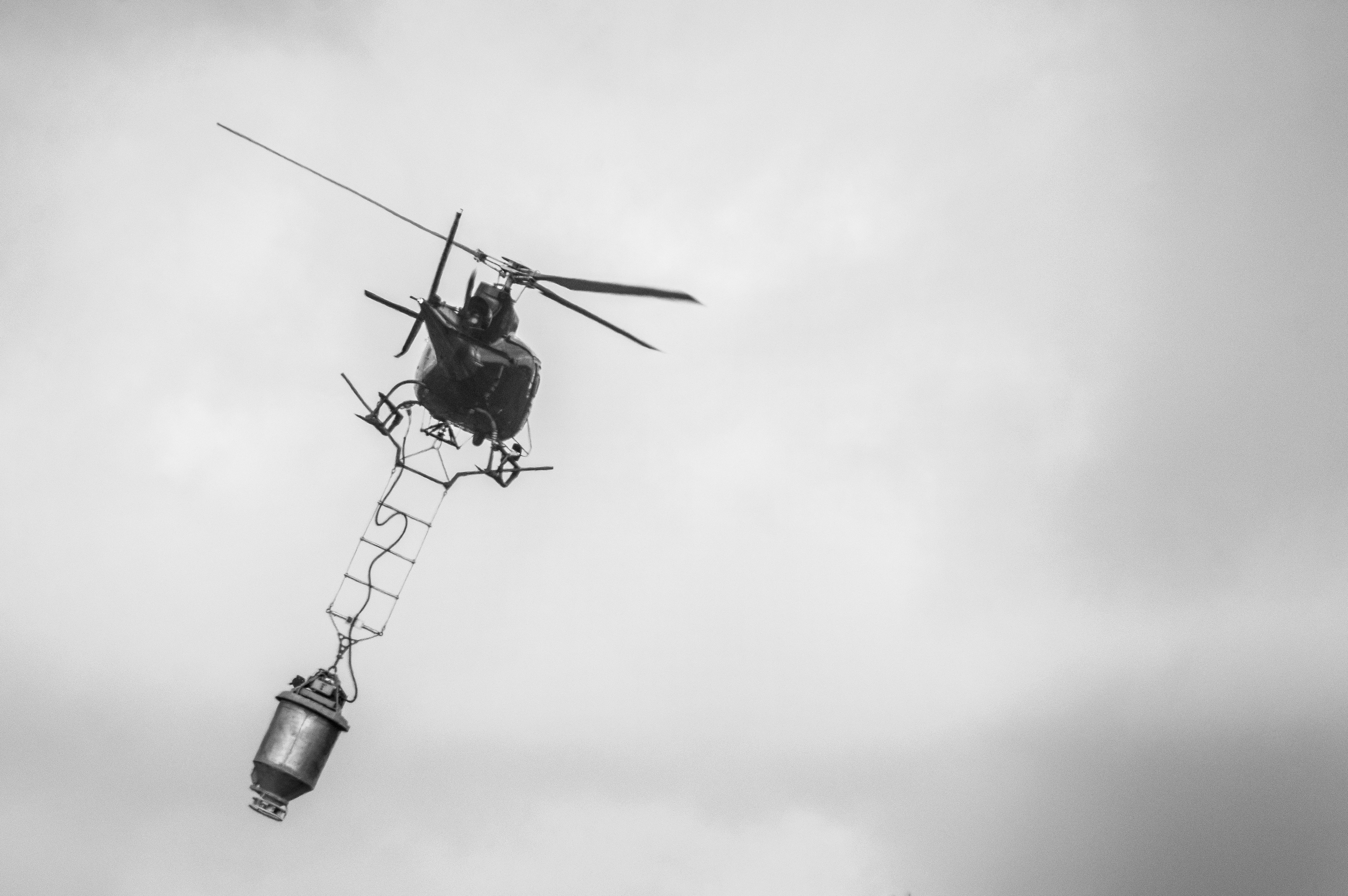 a black and white photo of a helicopter