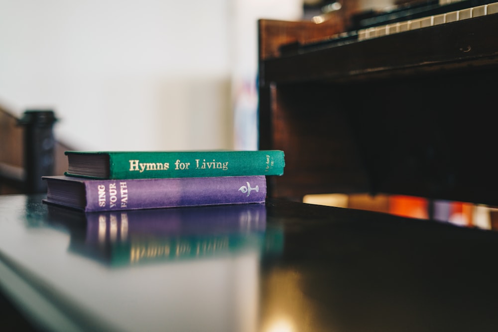 two books sitting on top of a table