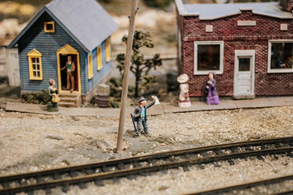 a model of a small town with a train track