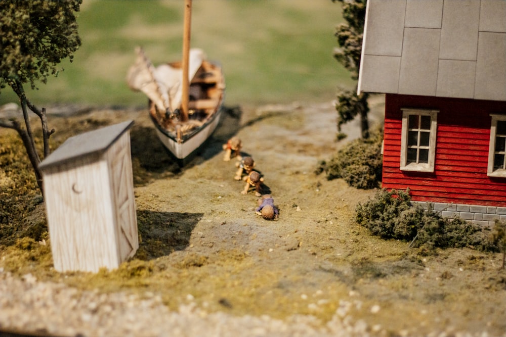 a model of a boat and a small house