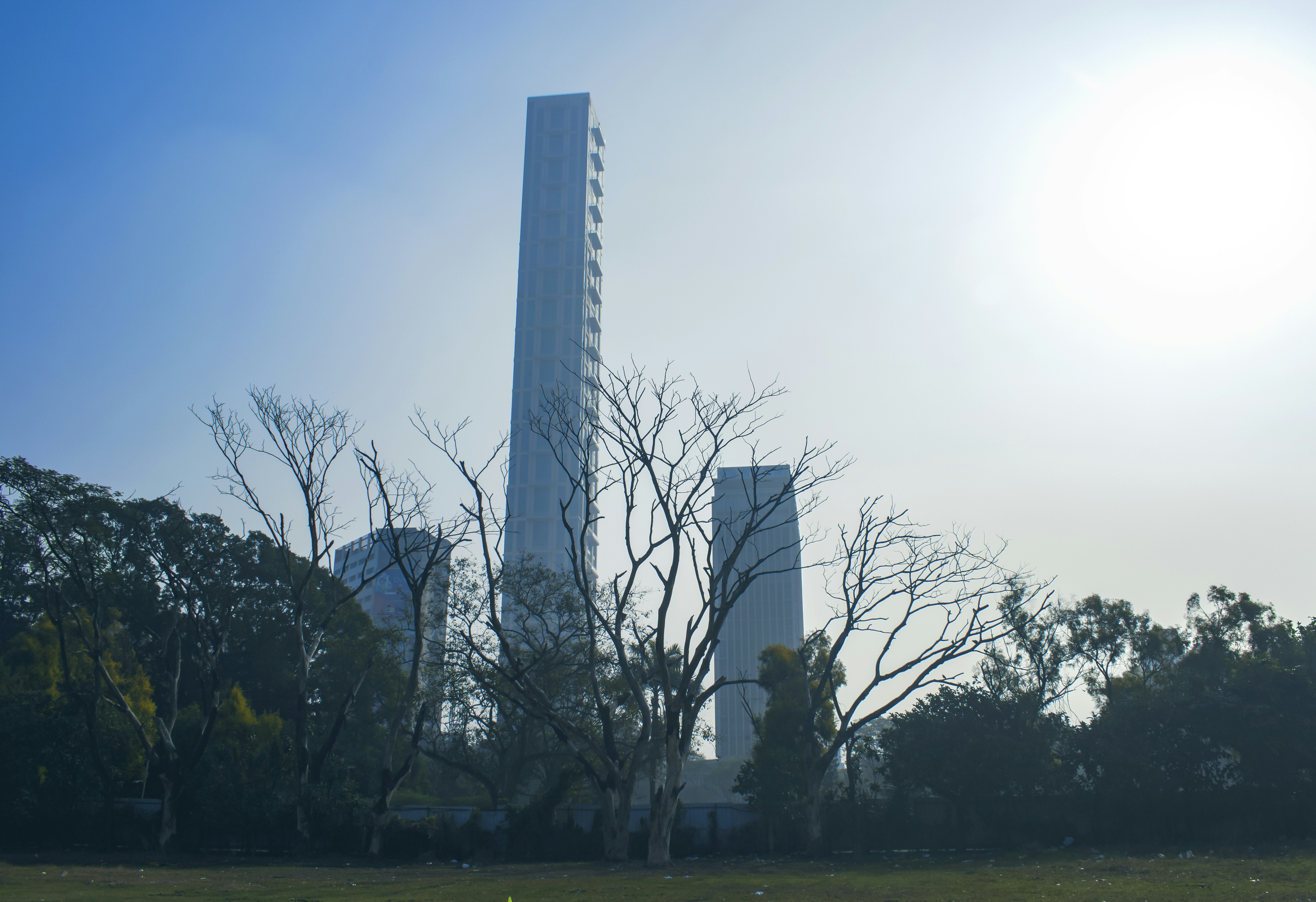 a tall tower with a clock on the top of it
